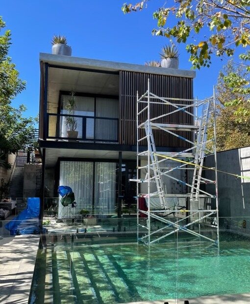 Exterior maintenance underway beside a residential pool in Fremantle